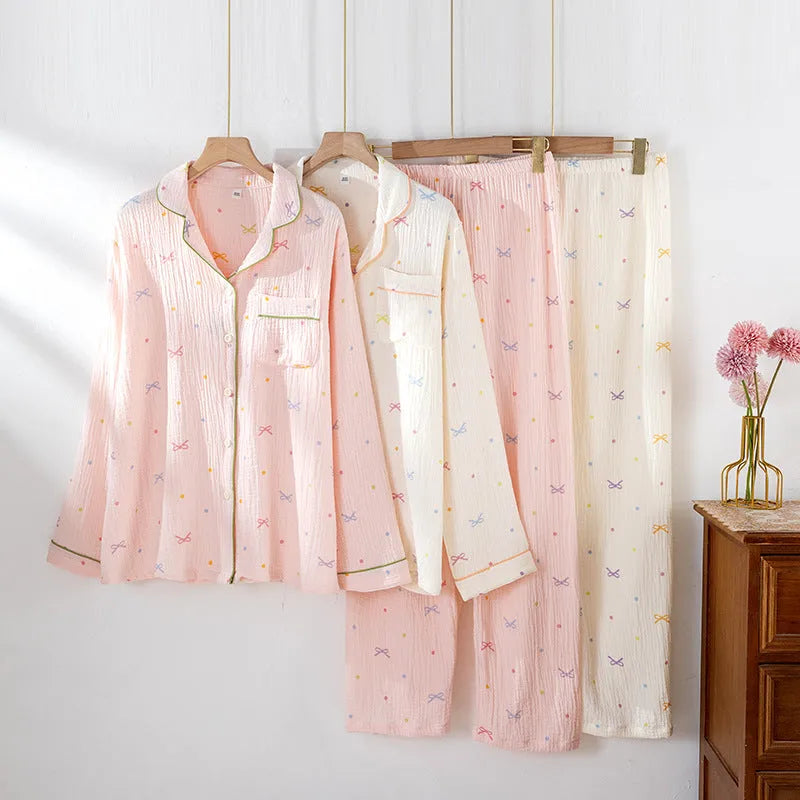 Women's beige cotton pajama suit with long sleeves and trousers for homewear.