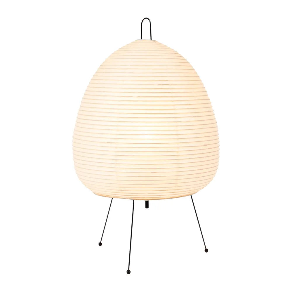 Japanese style rice paper table lamp with aluminium body and decorative shade on wooden surface