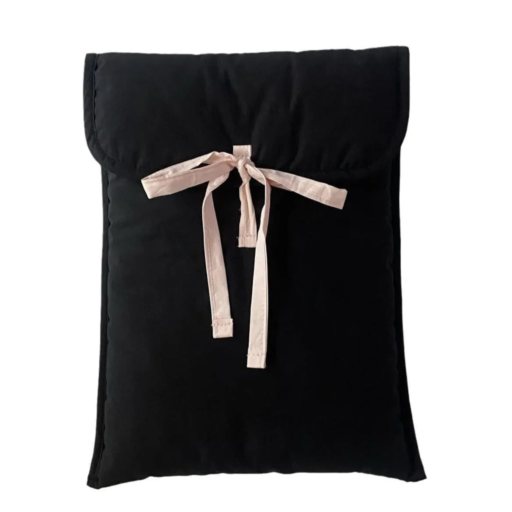 Women's black quilted laptop bag with ballet bow and striped pattern
