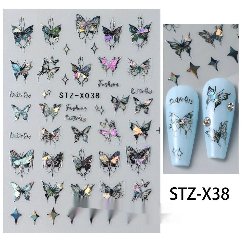 Sheet of black and silver love heart pattern nail art stickers with a plastic nail patch.