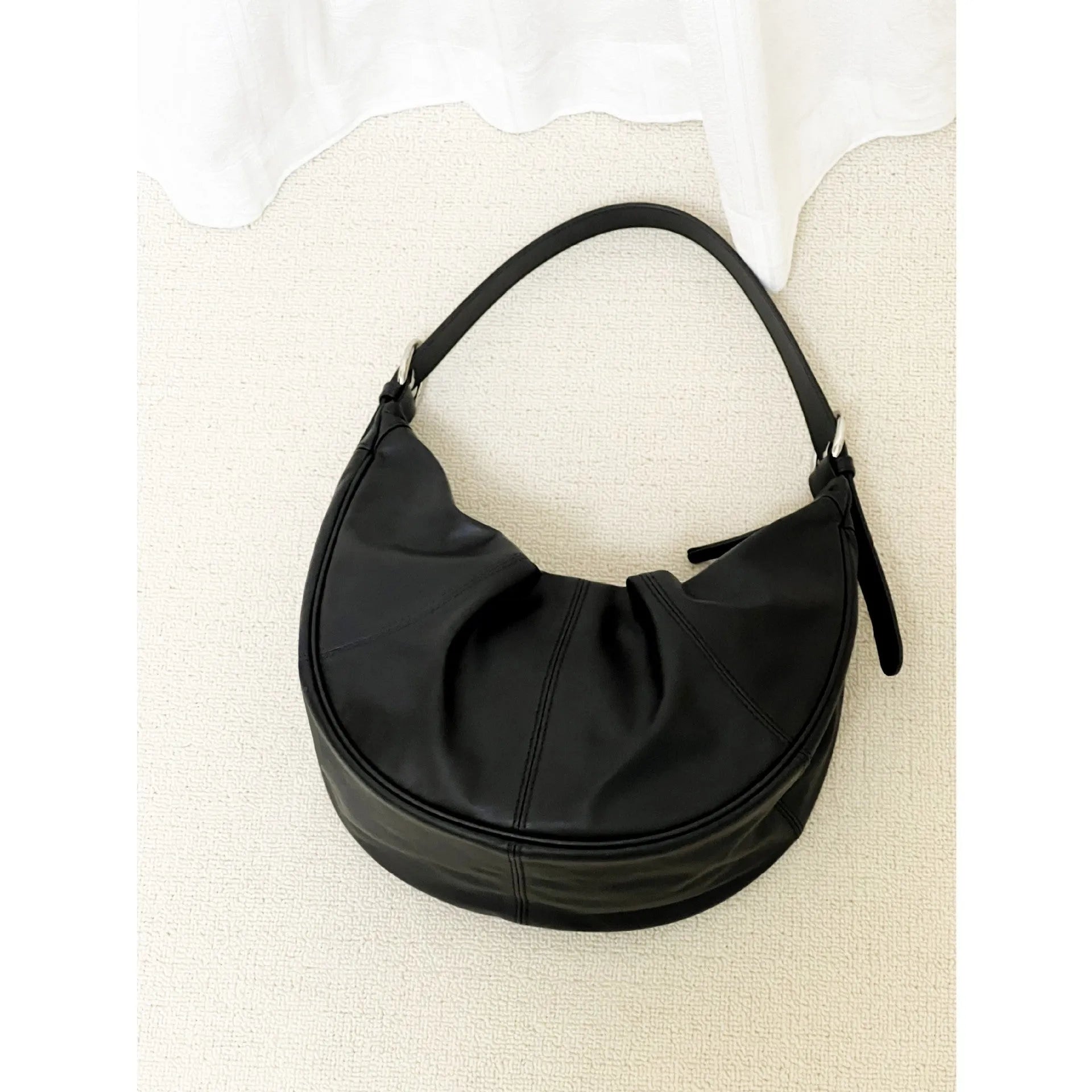 Women's dumpling-shaped shoulder bag in first layer cowhide leather with double shoulder straps