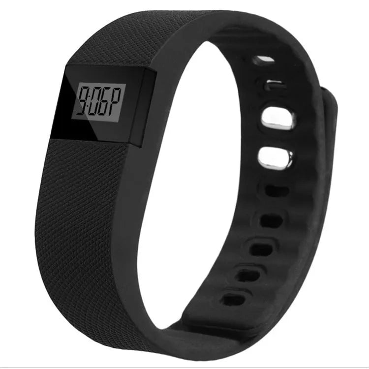 Ordinary bracelet pedometer showing step counter display on plastic wristband