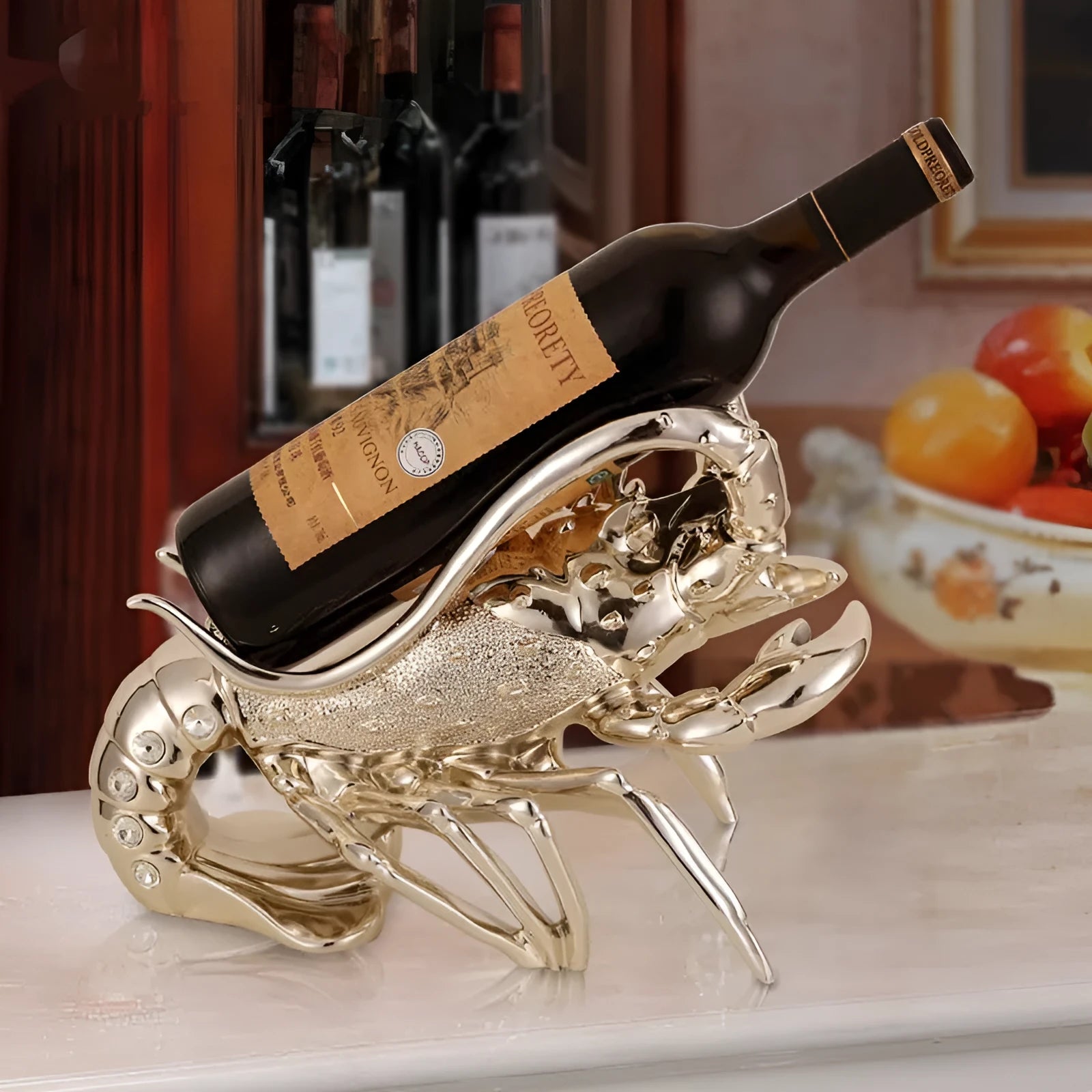 Lobster-shaped wine rack ornament in rose gold or silver, holding a single bottle.