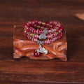 Handcrafted natural watermelon crystal bracelet with geometric beads and Chinese knot adjustable closure