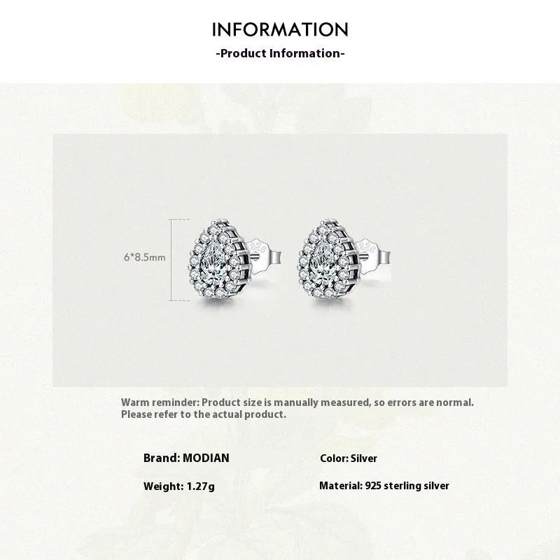 Silver water drop shaped ear studs with diamond treatment surface texture
