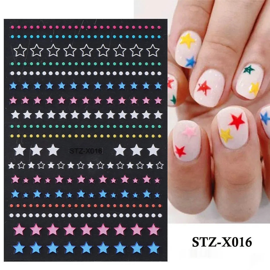 Sheet of black and silver love heart pattern nail art stickers with a plastic nail patch.