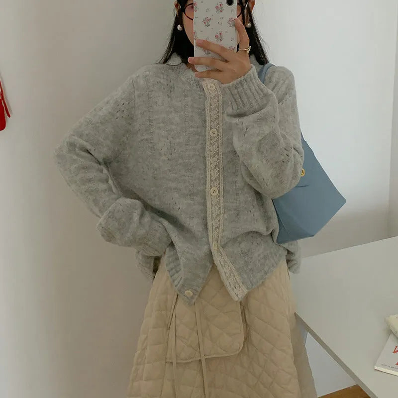 Artistic retro loose-fit sweater coat in viscose fibre, shown in apricot colour.