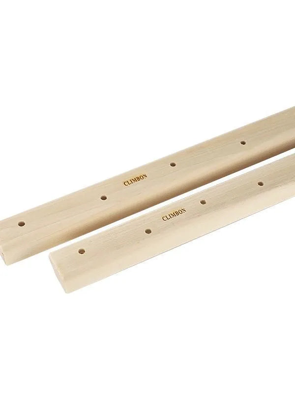 Set of three solid wood grip strength training hangboards in varying thicknesses.