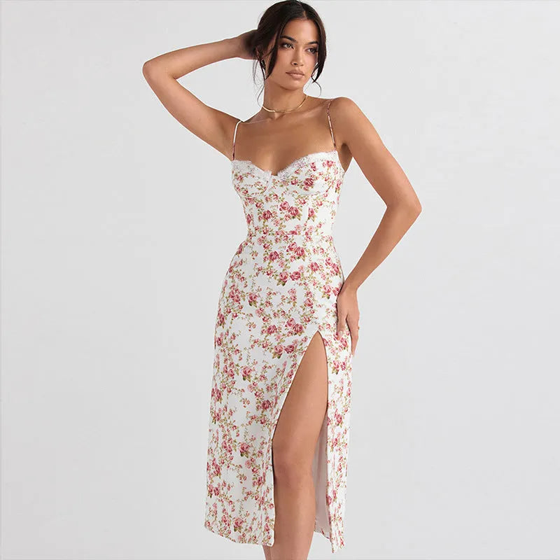 Women's blue long dress with white lace flower print, side slit, and thin adjustable suspender straps.