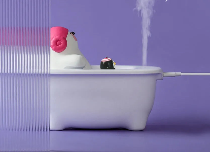 White USB-powered desktop air humidifier with water tank and mist output