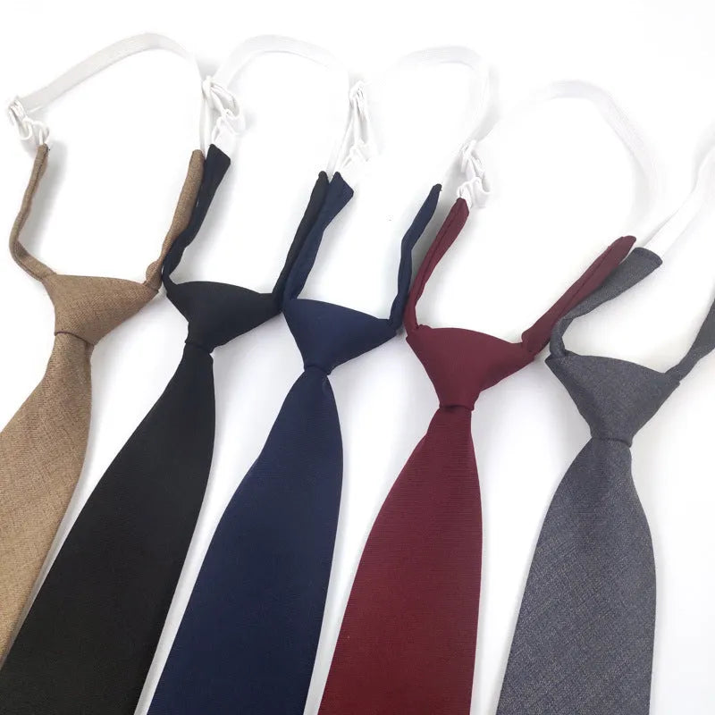 Men's solid colour cotton bow tie in arrow style, showing navy blue colour option.