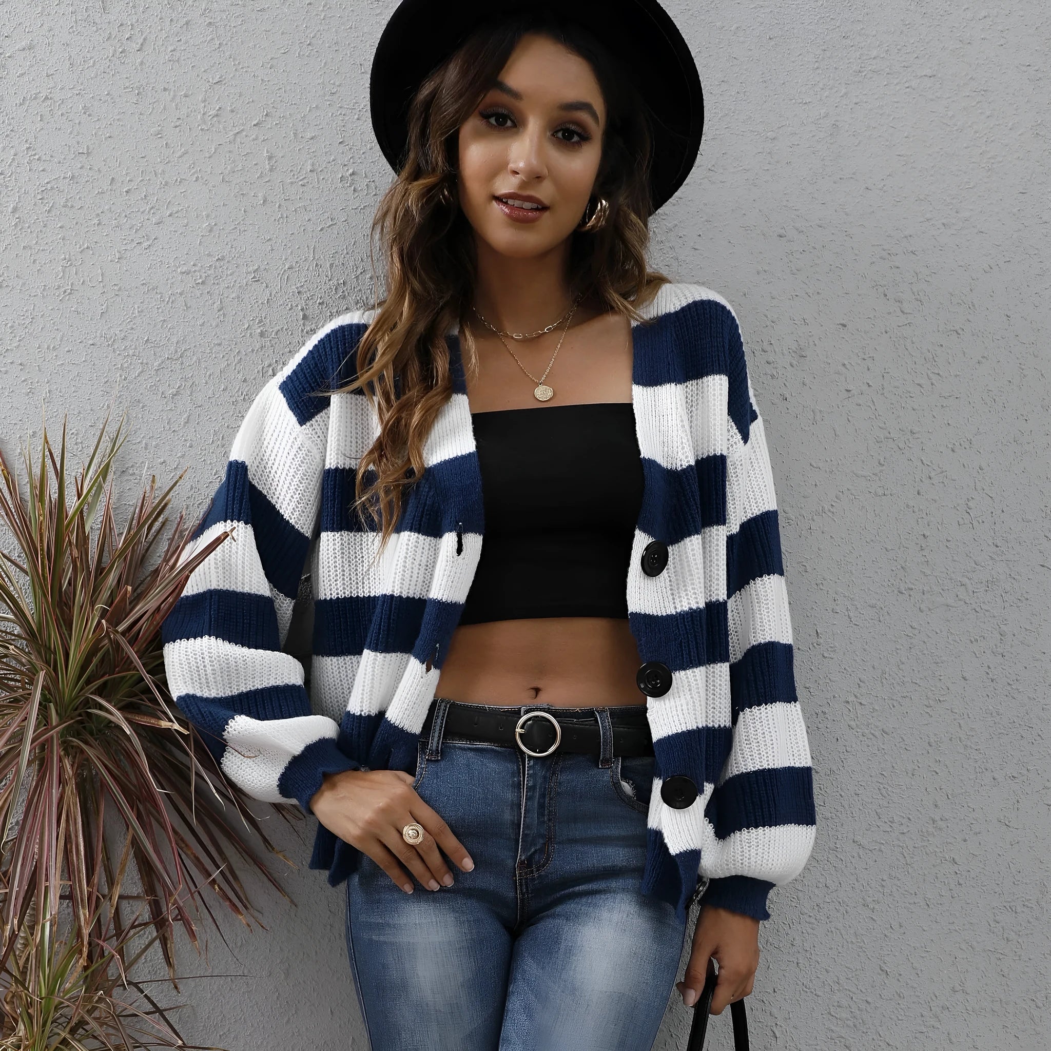 Women's striped deer plush cardigan in blue, showing button front and regular sleeves.