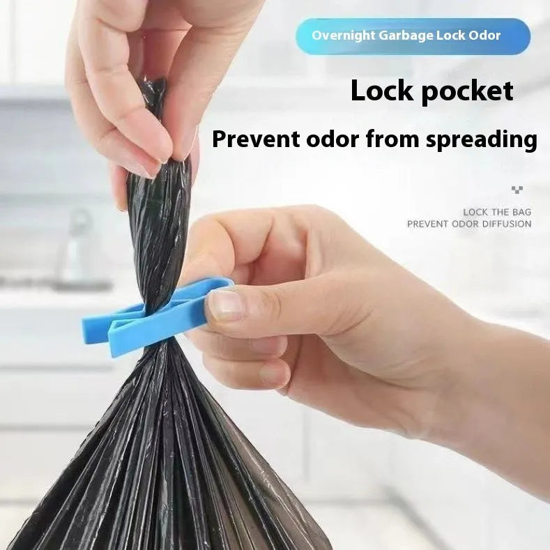 White plastic rubbish bag clip with adjustable 16mm jaws for securing bin liners.