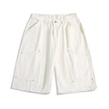Women's workwear rivet cropped pants in wide-leg design showing apricot colour option with mid waist