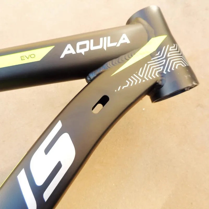 Black green 29-inch aluminium mountain bike frame with disc brake mount and internal cable routing ports.