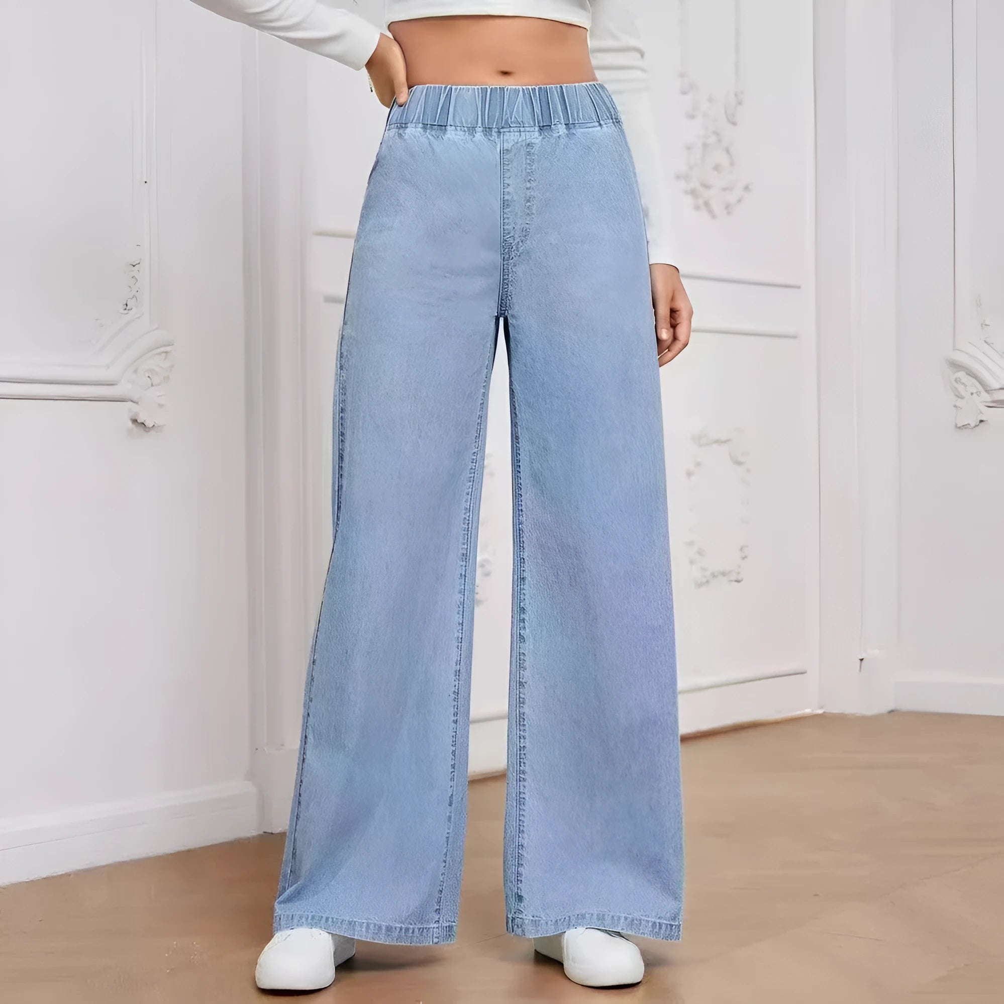 Light blue washed denim trousers with wide-leg straight cut and mid waist design