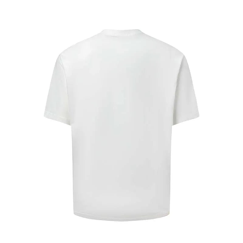 Man wearing a blue loose-fit T-shirt with a large white American retro style letter print on the front.