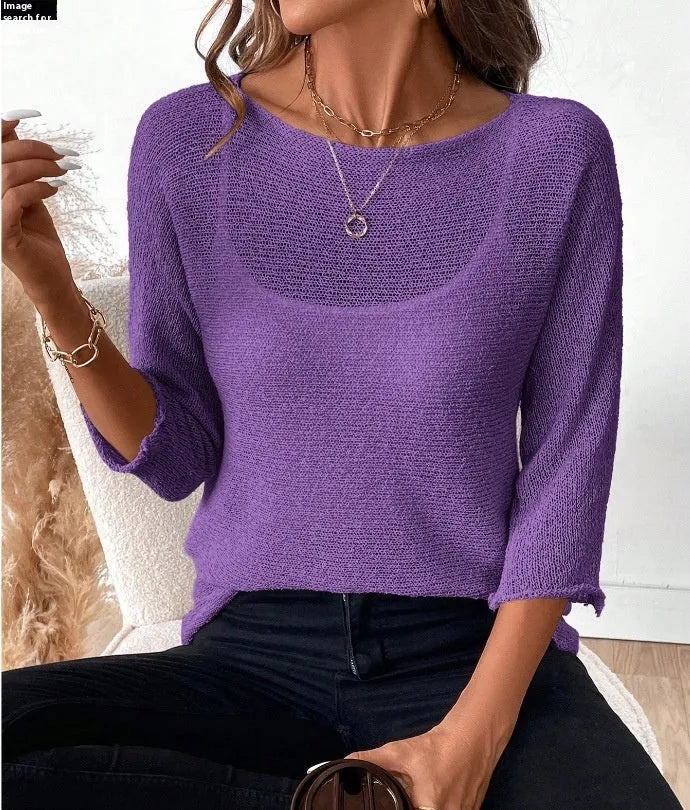 Women's off-shoulder knitted pullover top in lavender purple with a 3D pattern and 3/4 length sleeves.