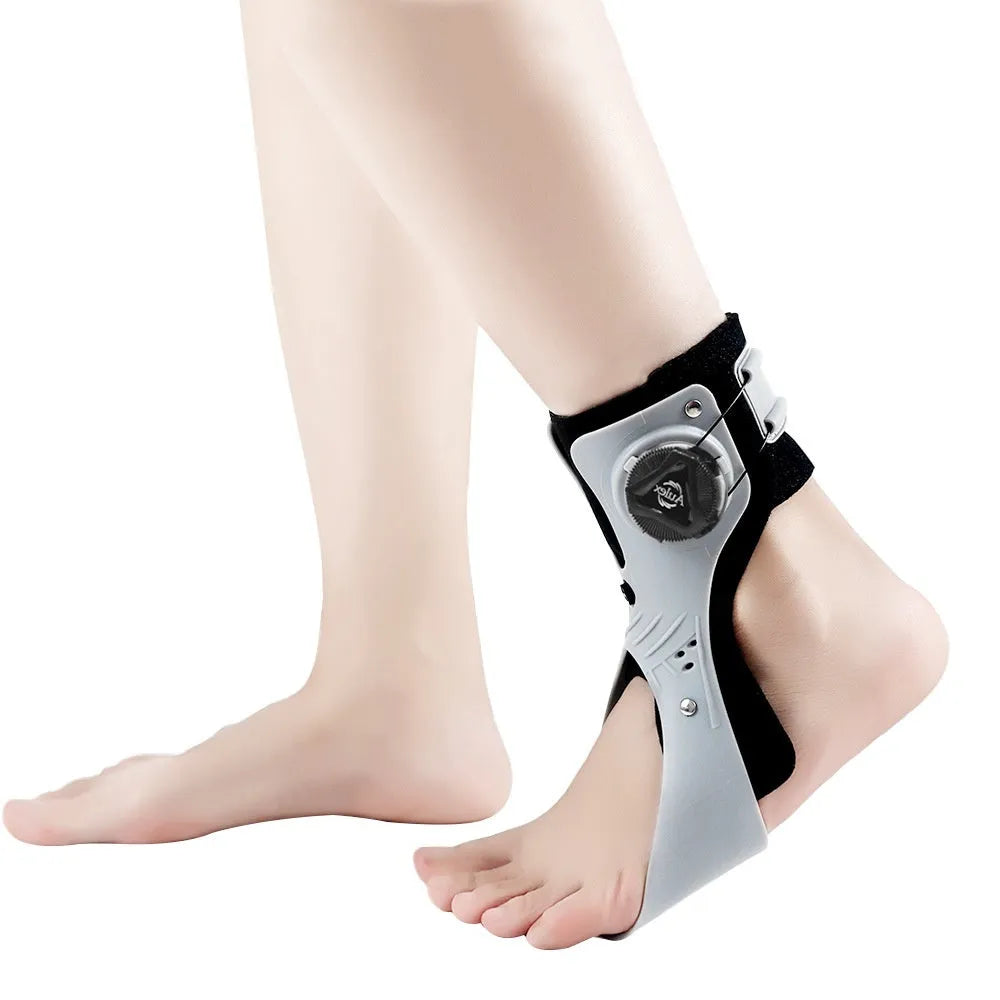 Grey and black adjustable airbag ankle support brace shown on a left and right foot.