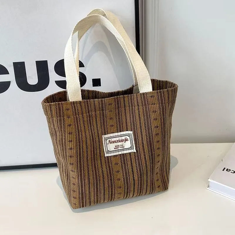 Japanese style large corduroy shoulder bag in dark brown colour showing textured fabric and casual design.