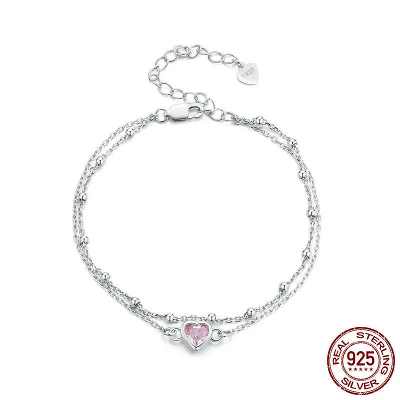 Sweet girlish heart-shaped sterling silver bracelet with a 6mm pendant on an adjustable chain