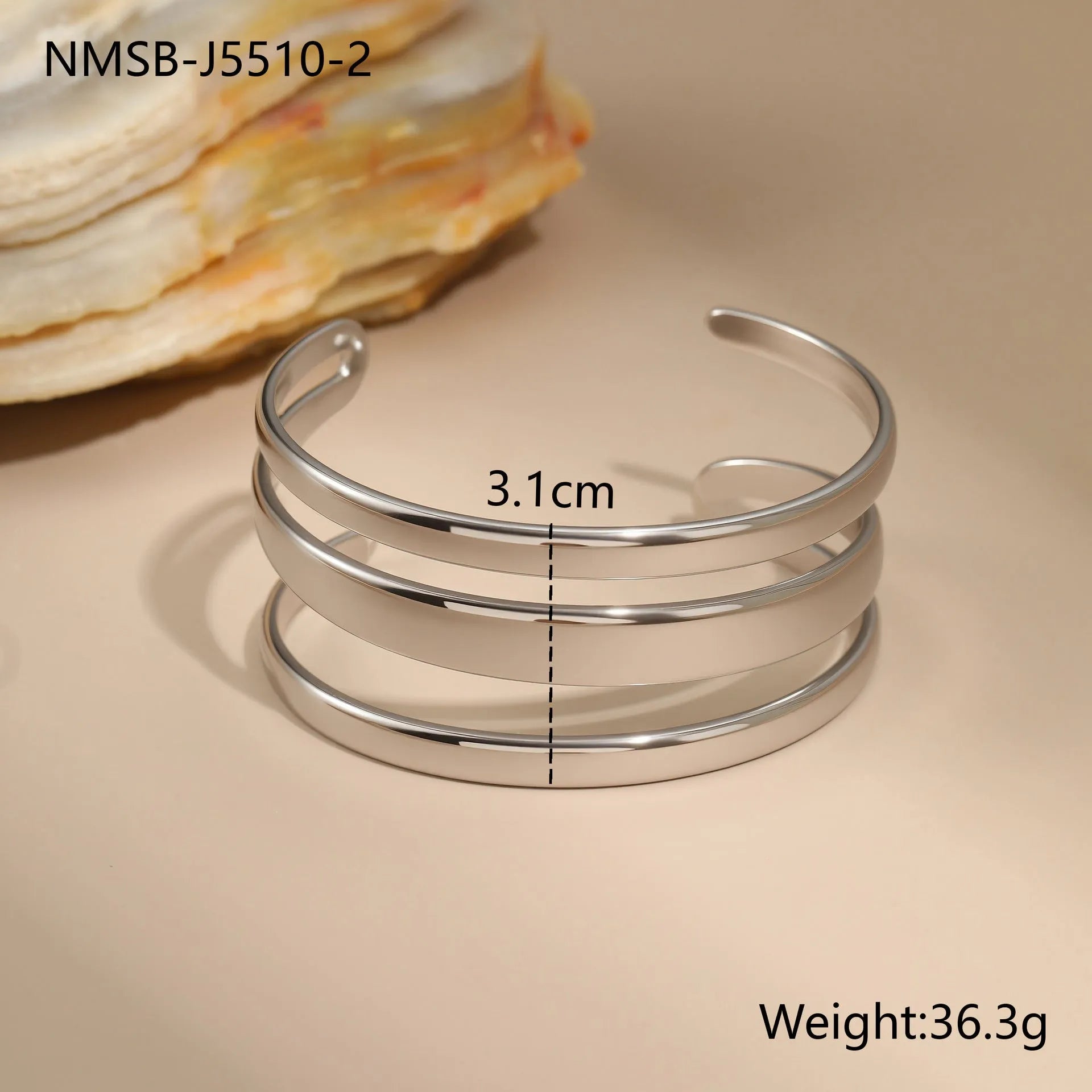 Stainless steel geometric line bracelet with simple opening clasp in gold or steel finish