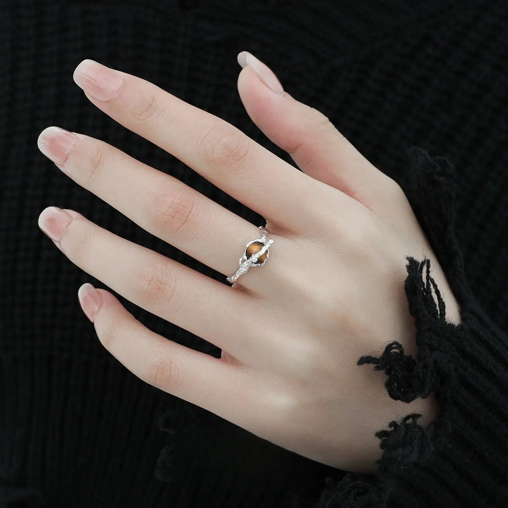 White gold colour Saturn Tigereye open adjustable ring for women on display
