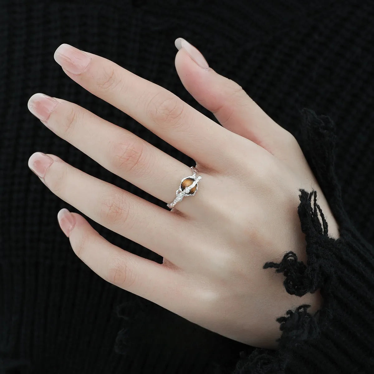 White gold colour Saturn Tigereye open adjustable ring for women on display
