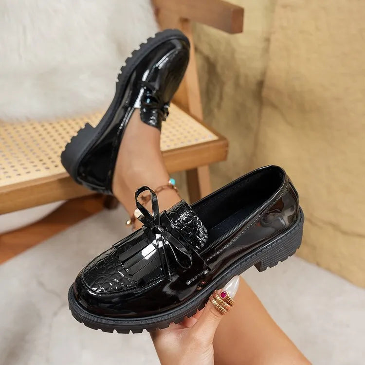Women's brown loafers with bow detail on artificial PU upper, flat slip-on style