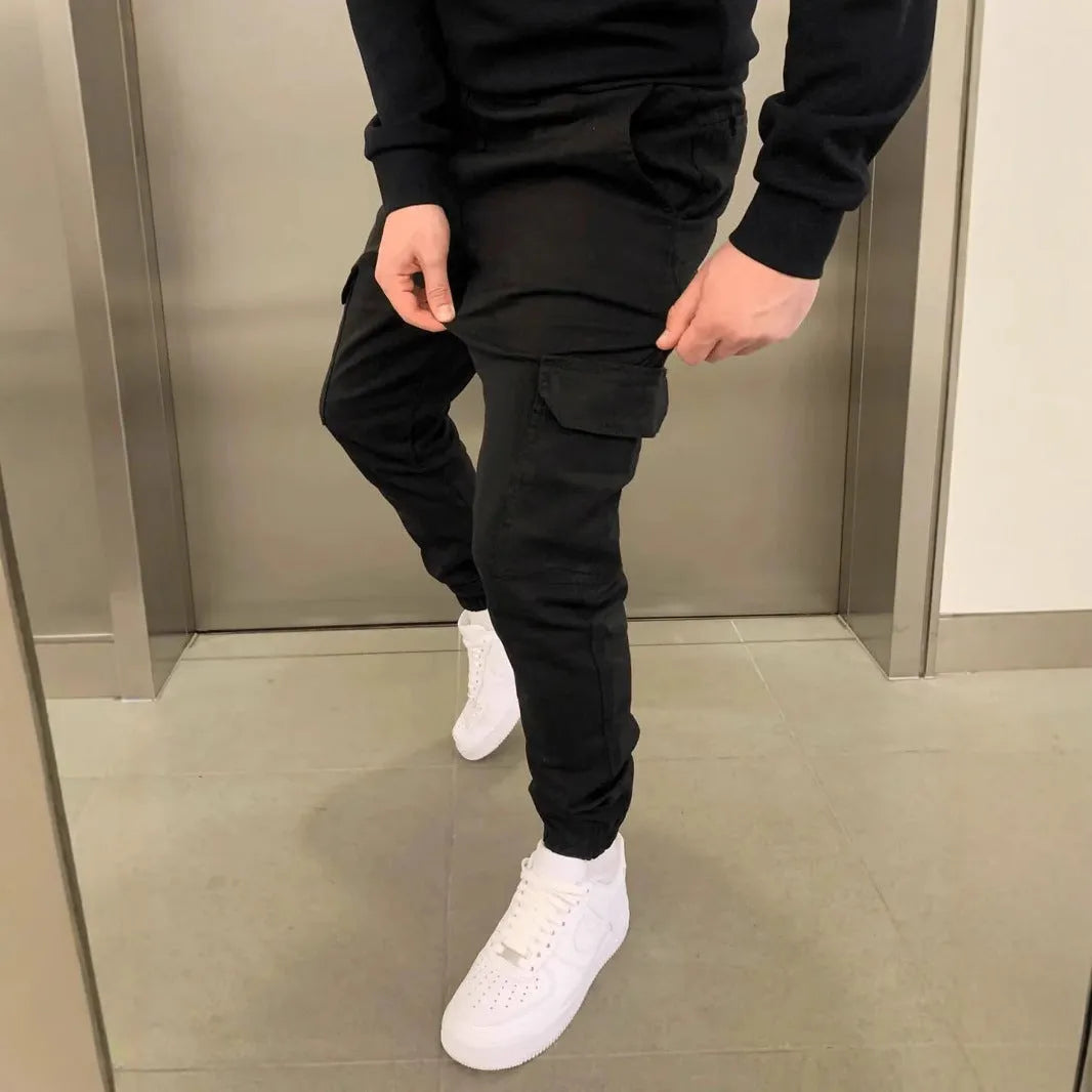Men's loose fit casual trousers with dimensional patch pockets in light blue colour