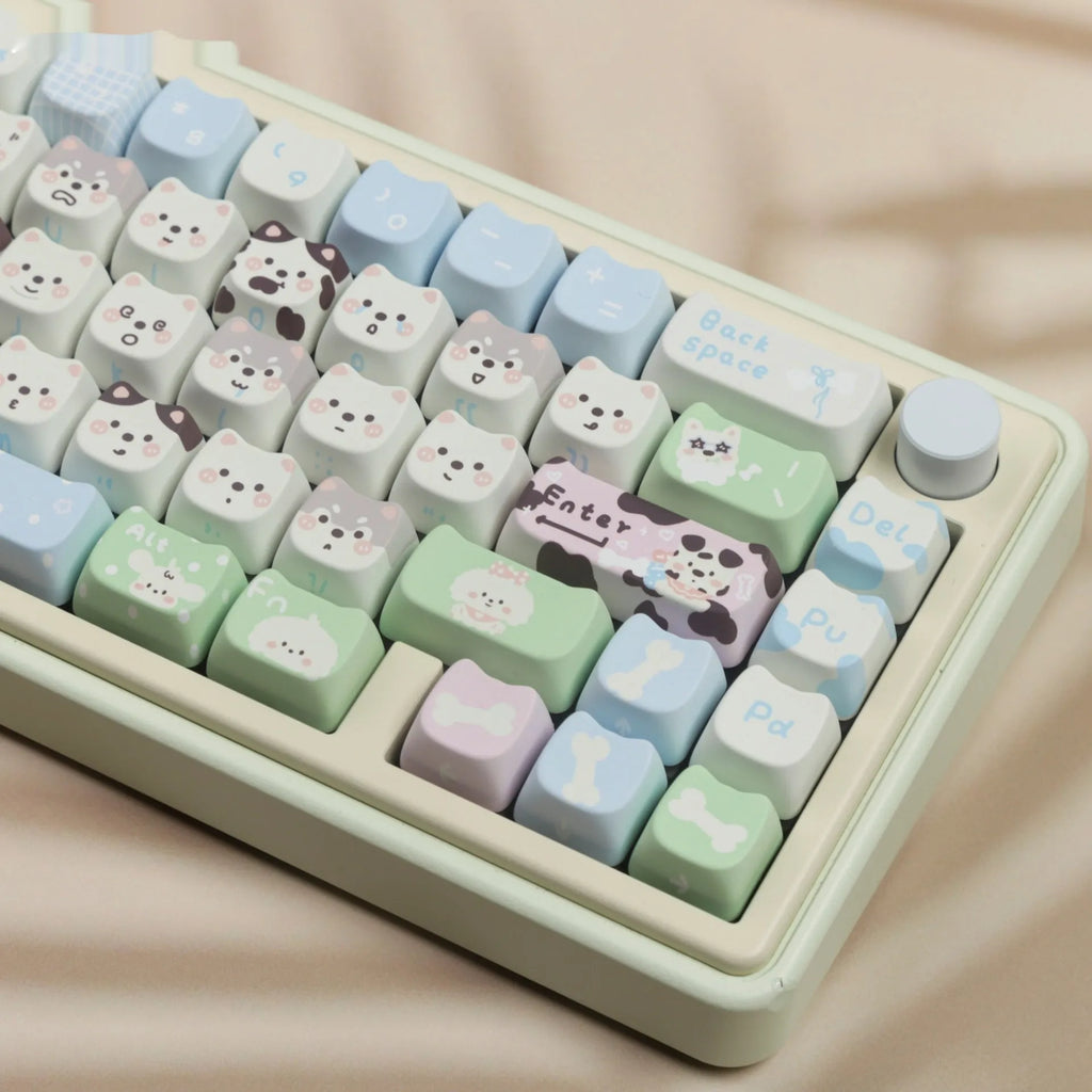 Colourful cat and puppy themed PBT key cap set for mechanical keyboards with cartoon animal artwork