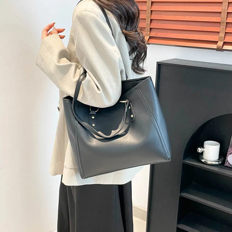 Square black PU underarm shoulder bag with a sandwich pocket design shown from the front.