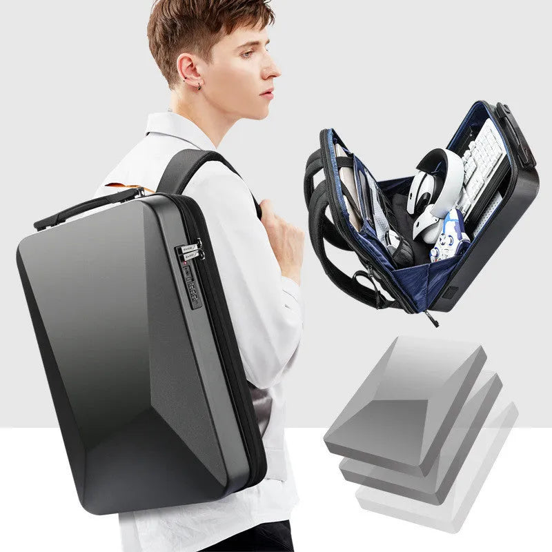 Large black PC hard shell gaming backpack with dual shoulder straps and a lock closure.