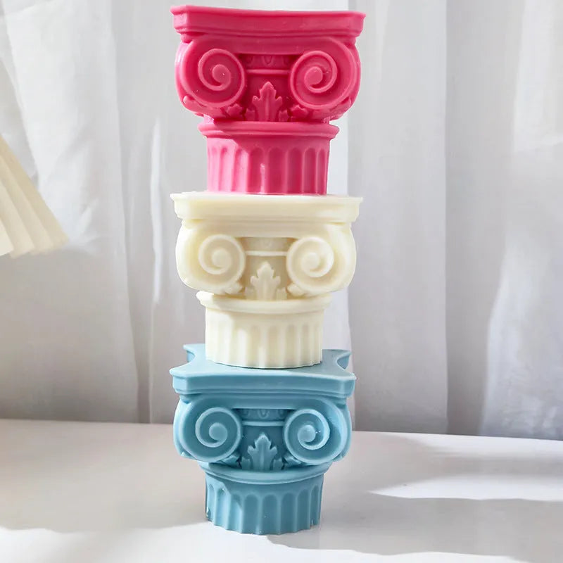 Flexible silicone Roman pillar candle mould on a white background