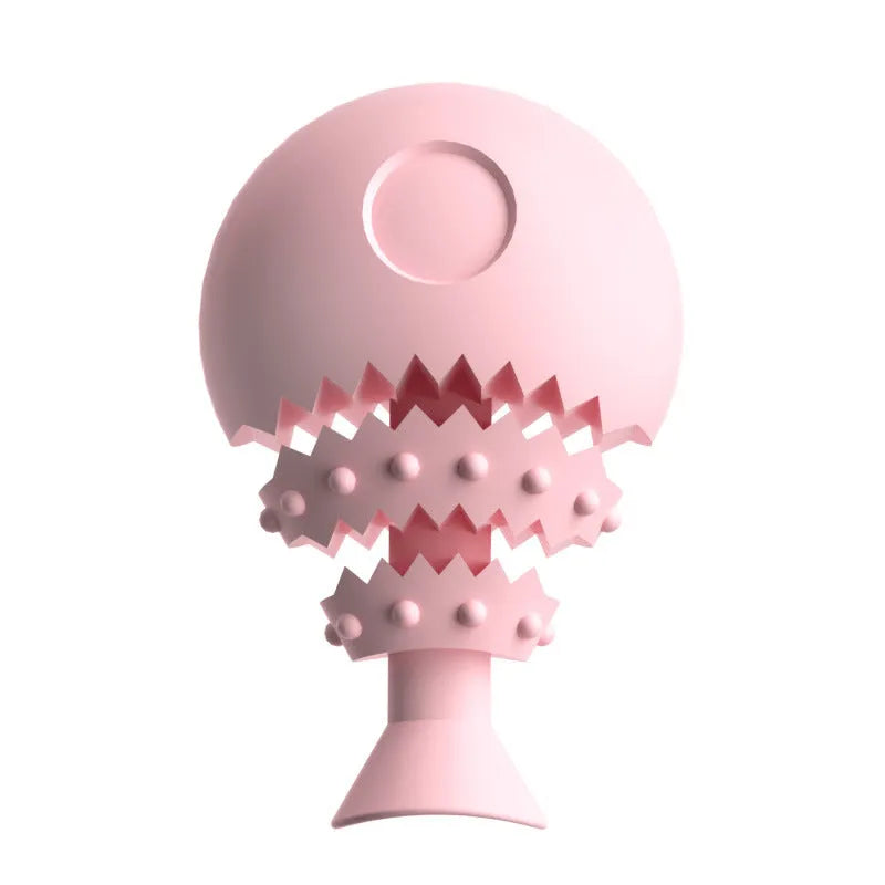 Blue fish bone shaped dog chew toy for teeth cleaning with a treat hole, shown next to a green and pink version.