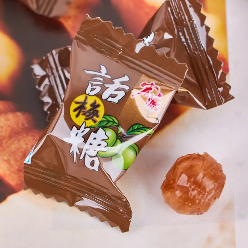 Three bags of hard candy: plum sugar, guava and tangerine peel flavours in 350g and 355g sizes