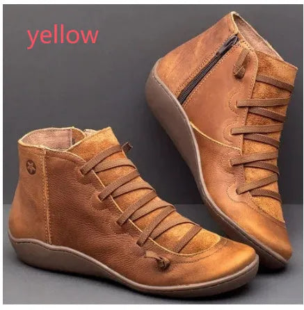 Women's black casual ankle booties with a flat wedge heel and round toe, made from PU with a rubber sole.