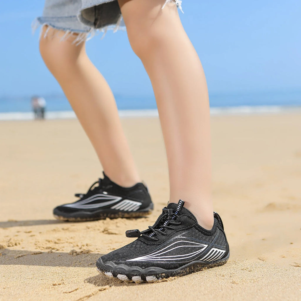 Children's quick-drying wading shoe with non-slip rubber sole and elastic band, shown in blue.