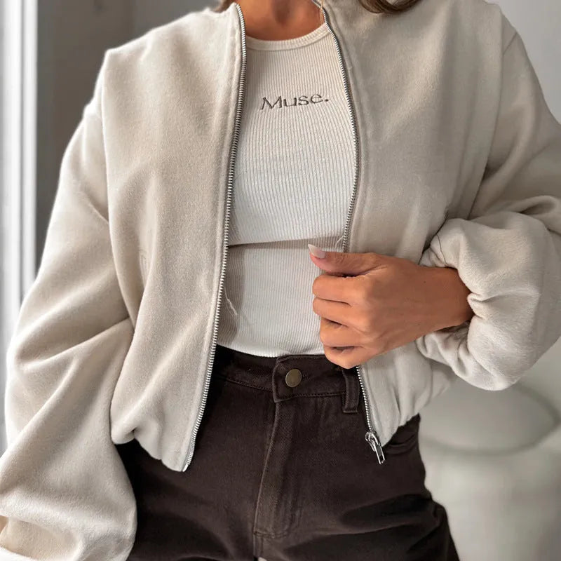 Women's loose-fitting off-shoulder coat with lantern sleeves in brown, showing front view.
