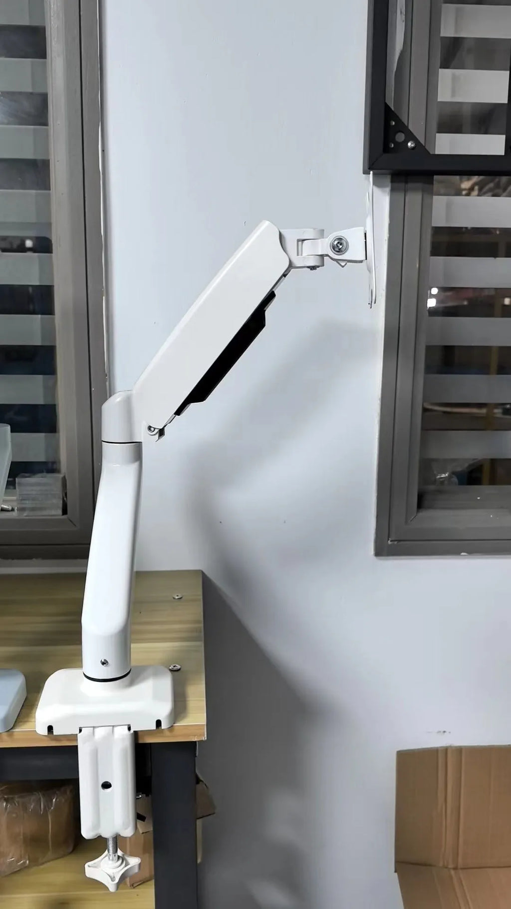 Black LCD screen rotating telescopic bracket elevated rack on desk with adjustable height and rotation mechanism