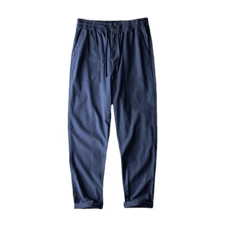 Men's linen trousers in solid colour with mid waist design for casual leisure wear