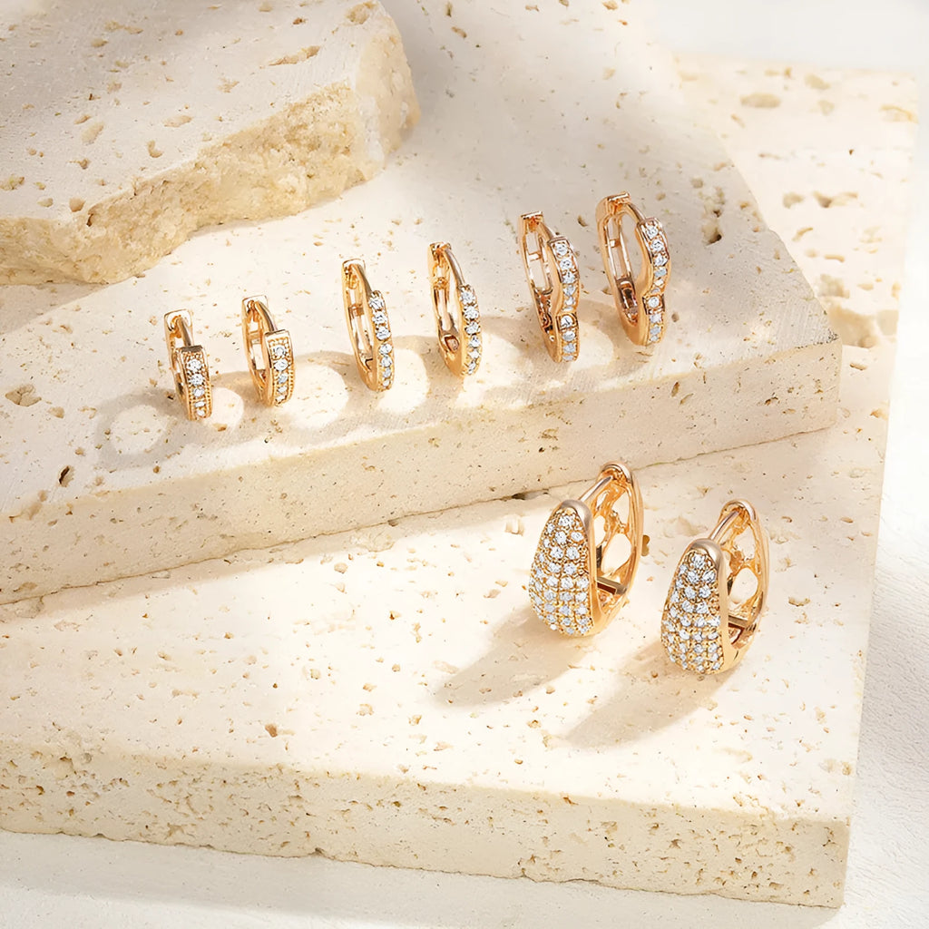 Gold-plated heart-shaped clip earrings with clear zircon stones