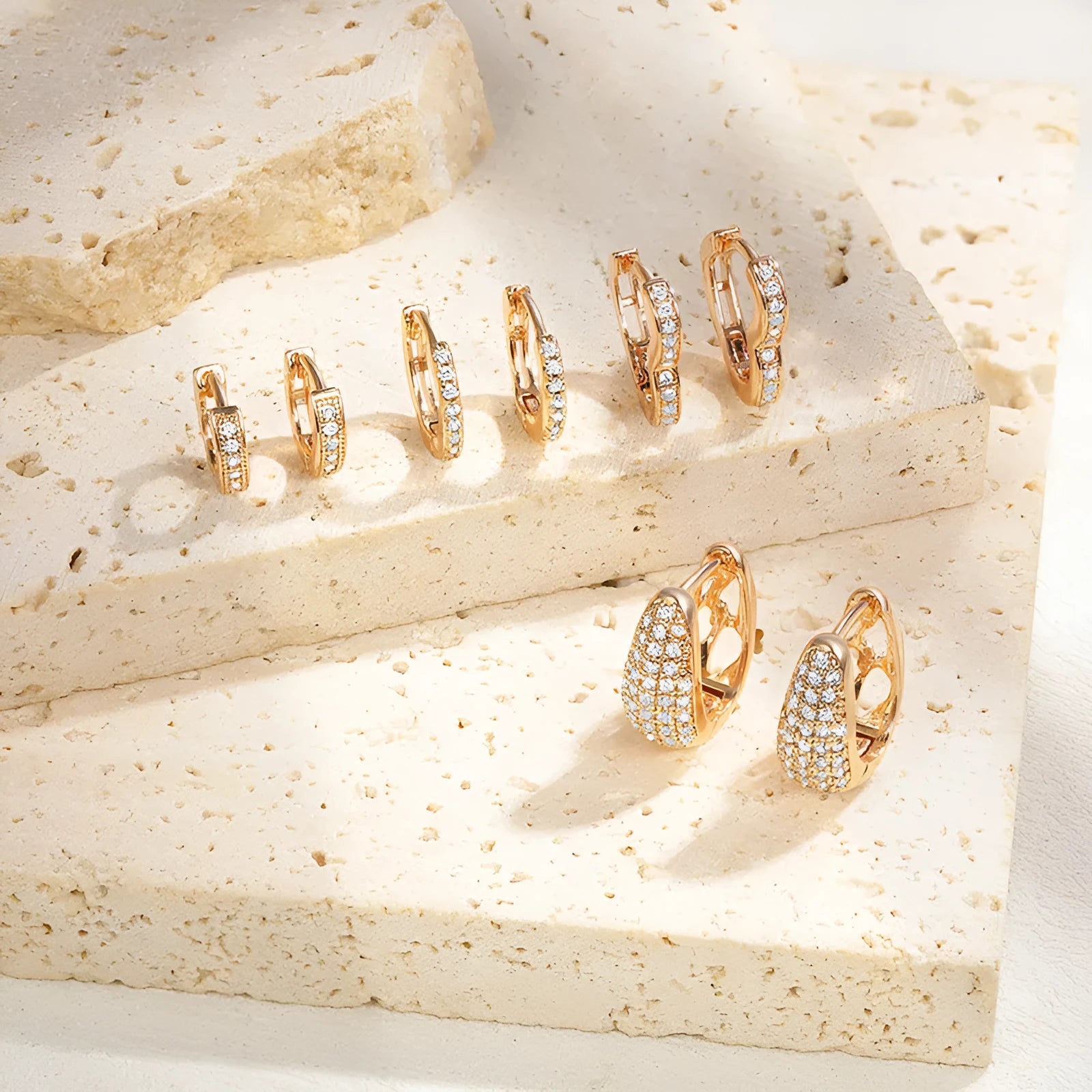 Gold-plated heart-shaped clip earrings with clear zircon stones