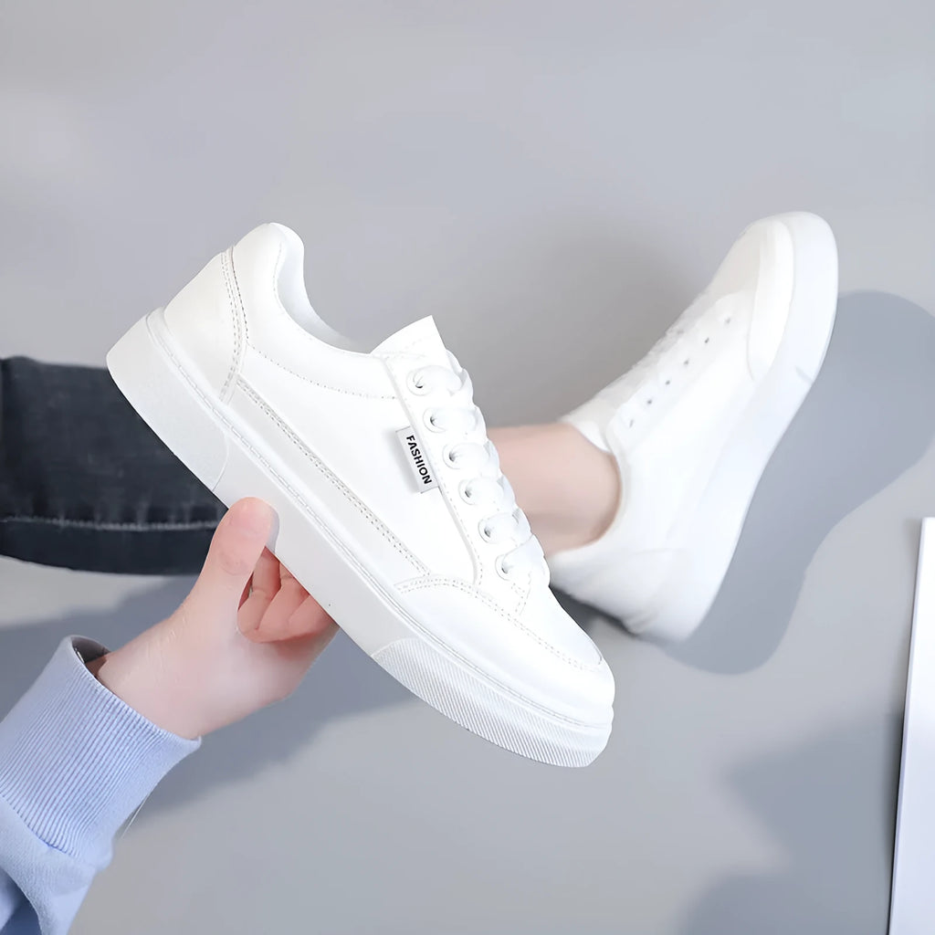 Korean style low-top women's sneakers in white or brown with artificial PU upper and plastic sole