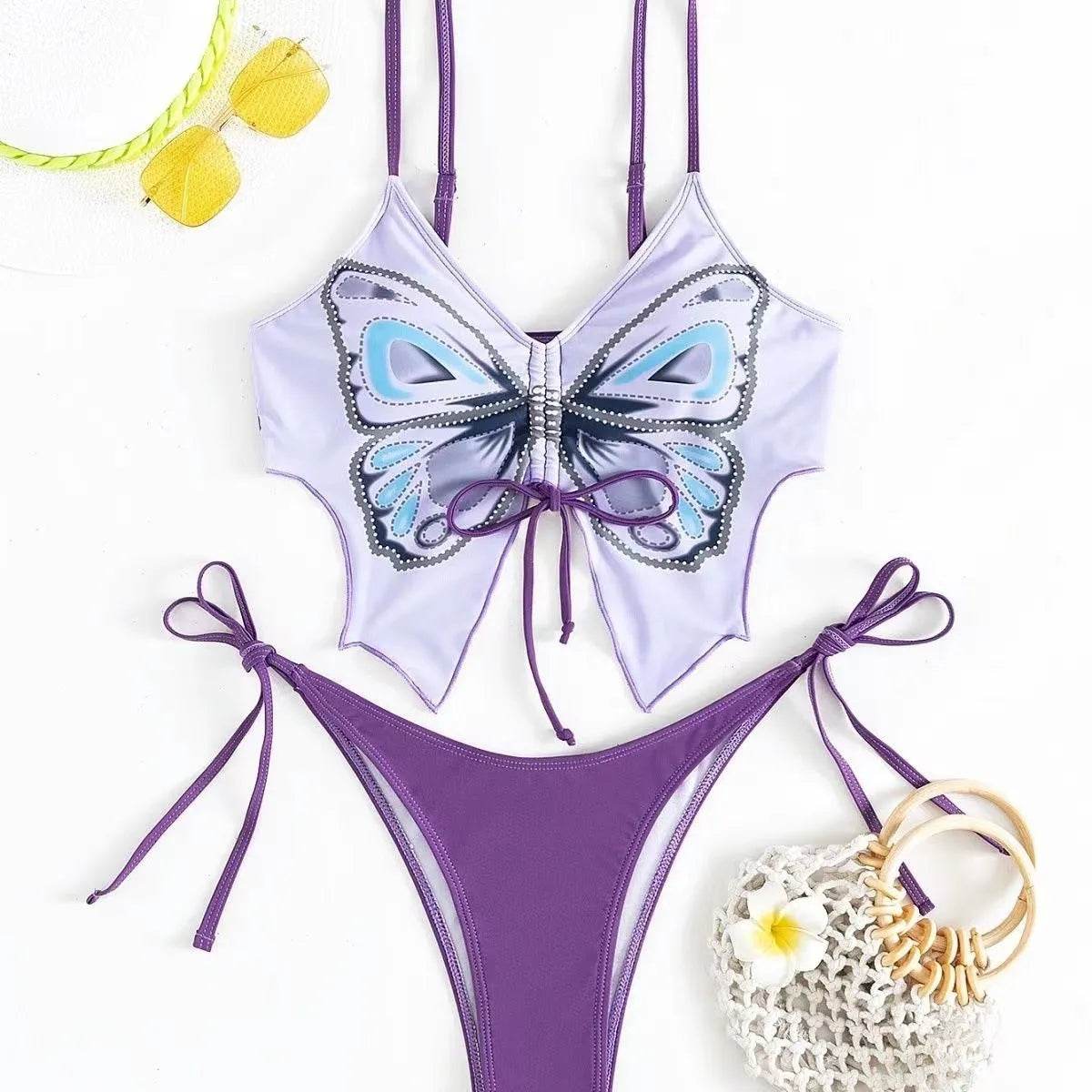Women's purple bikini with bow ins style back detailing and briefs bottoms