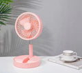 Black portable telescopic folding fan extended to full height with control panel visible.