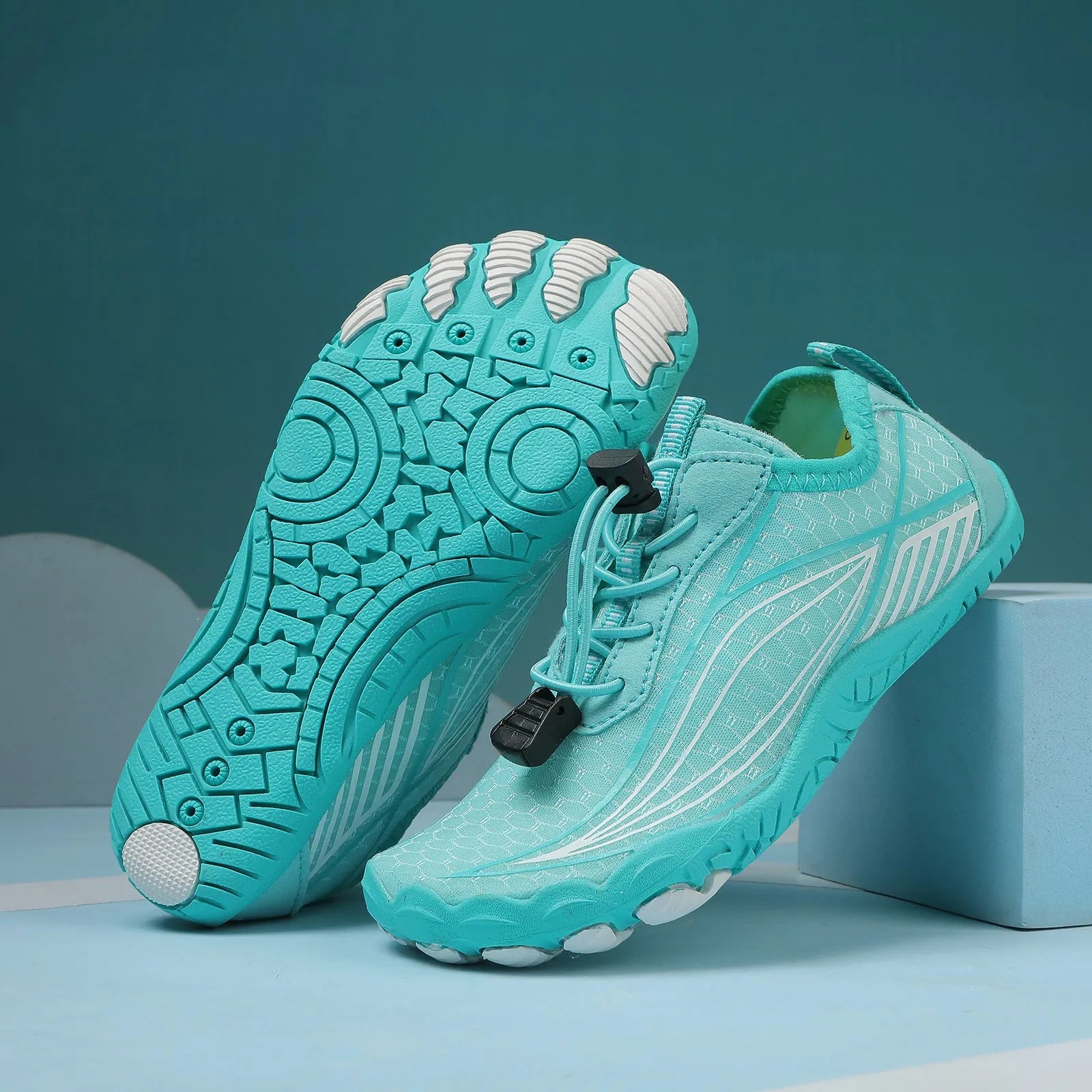 Children's quick-drying wading shoe with non-slip rubber sole and elastic band, shown in blue.