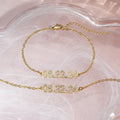Stainless steel digital bracelet with diamond studded numbers in gold finish.