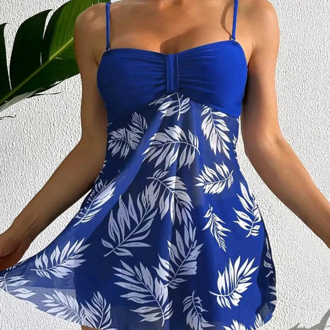 Women's high-waist mesh swimsuit briefs in black, blue, and peacock green on a white background.