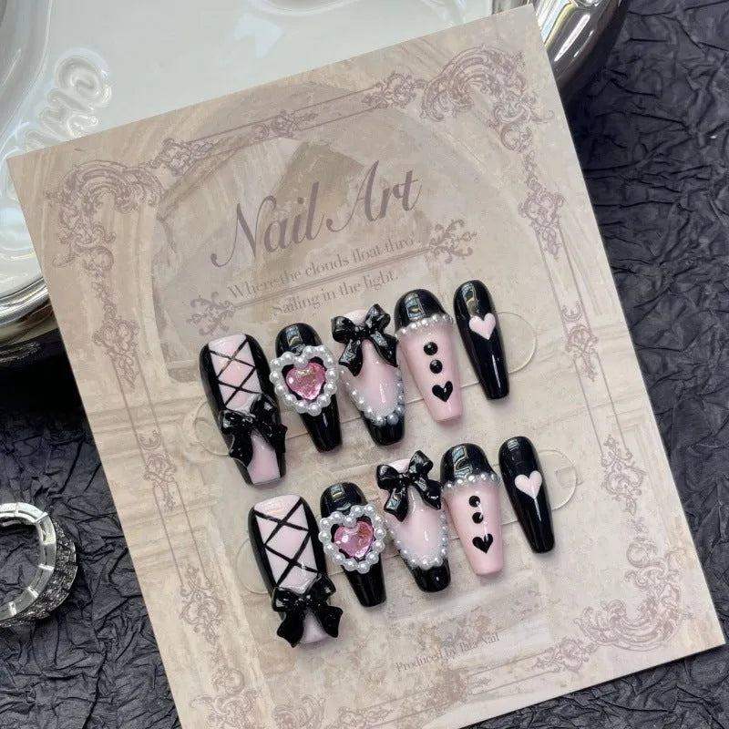 Black and pink heart hand-painted detachable manicure set with bow patterns in four sizes